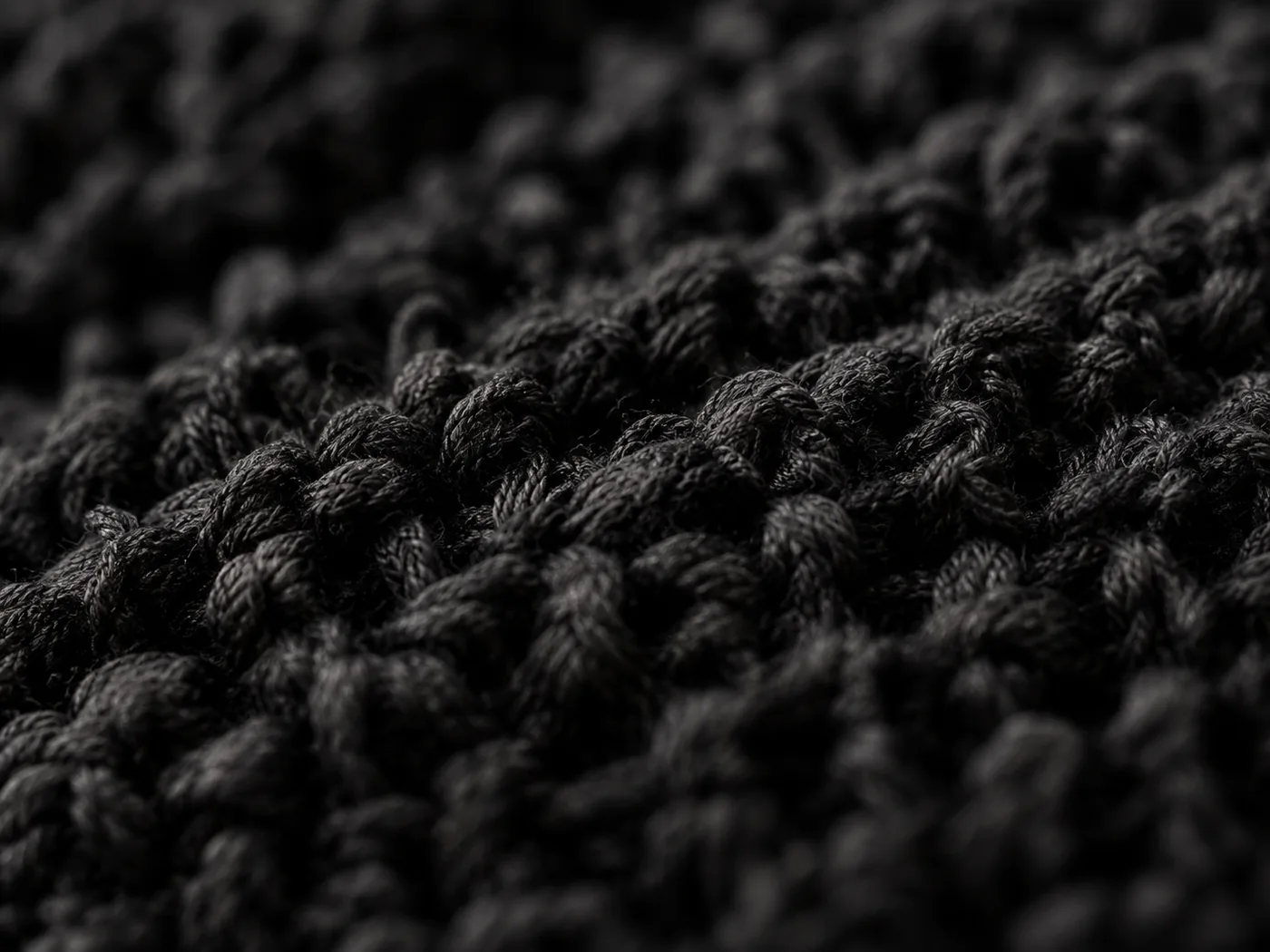 Close-up of textured black knit